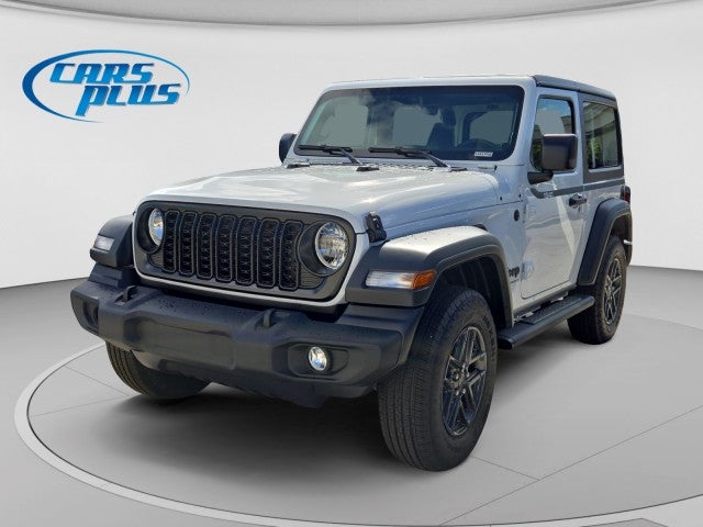 2026 Jeep Wrangler Sport in Bright White Clear-Coat Exterior Paint — front three-quarter view