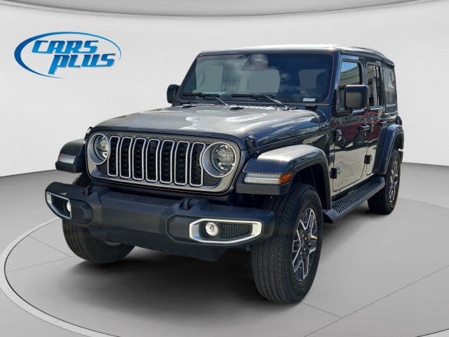 2026 Jeep Wrangler Sahara in Granite Crystal Metallic Clear-Coat Exterior Paint — front three-quarter view