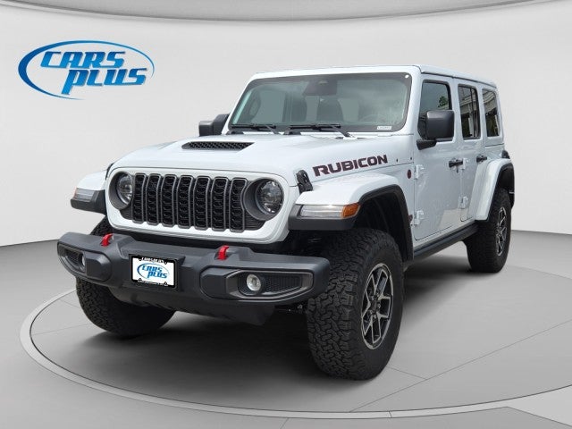 2026 Jeep Wrangler Rubicon in Bright White Clear-Coat Exterior Paint — front three-quarter view