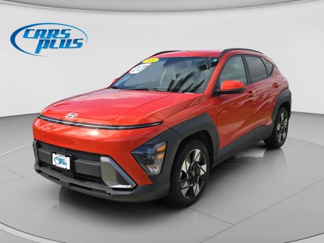 2024 Hyundai Kona SEL in Orange — front three-quarter view