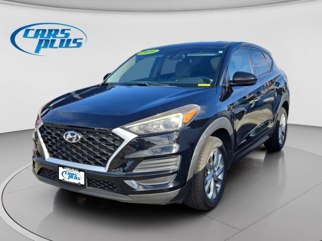 2020 Hyundai Tucson SE in Black — front three-quarter view